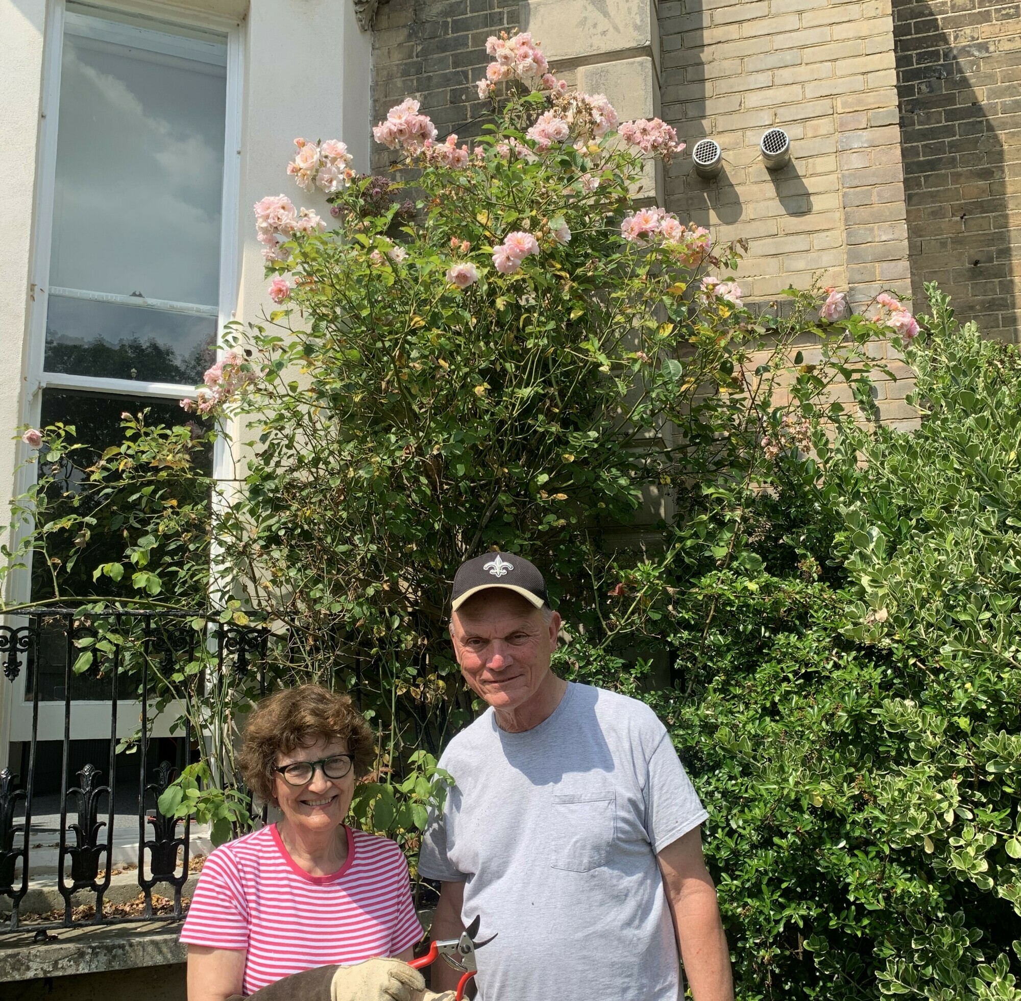 Leo and Kathleen with the Pemberton roses at Saint Francis Hospice