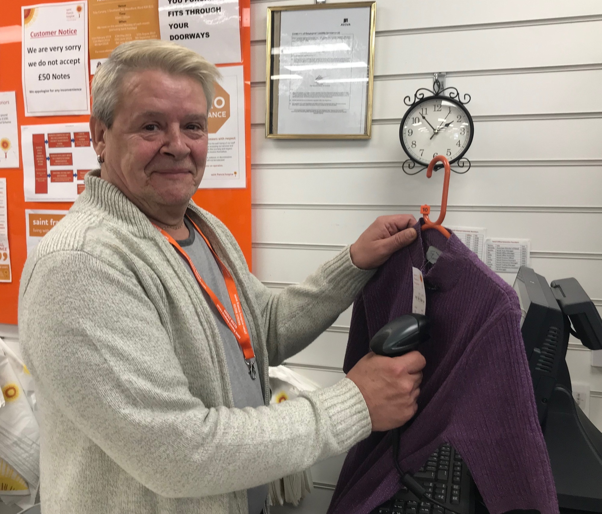 John on the till in the Barkingside store