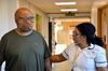 Service user engaging with a phsiotherapist